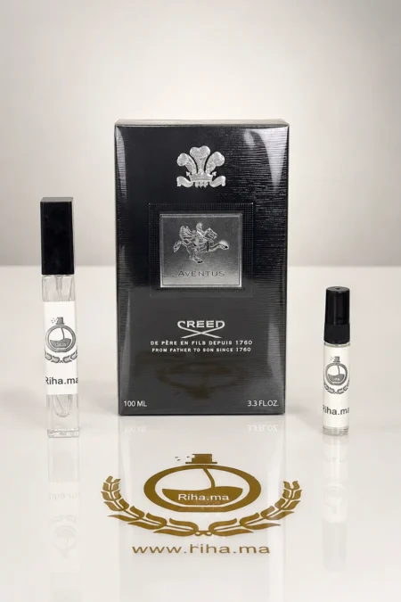 decantage aventus creed — Flacon de décantage aventus creed posé sur fond noir élégant