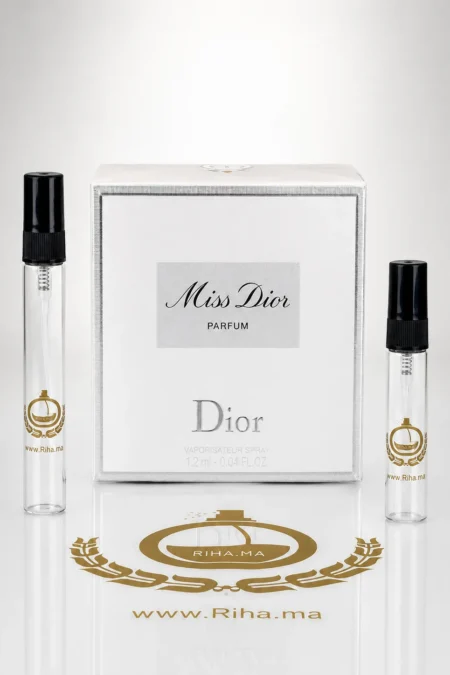 Flacon décantage Miss Dior Parfum sur fond rose élégant