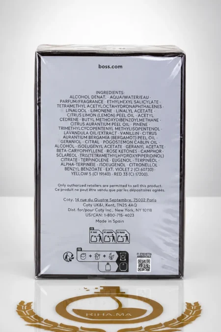 Flacon de boss man eau de toilette sur fond boisé — vue 2