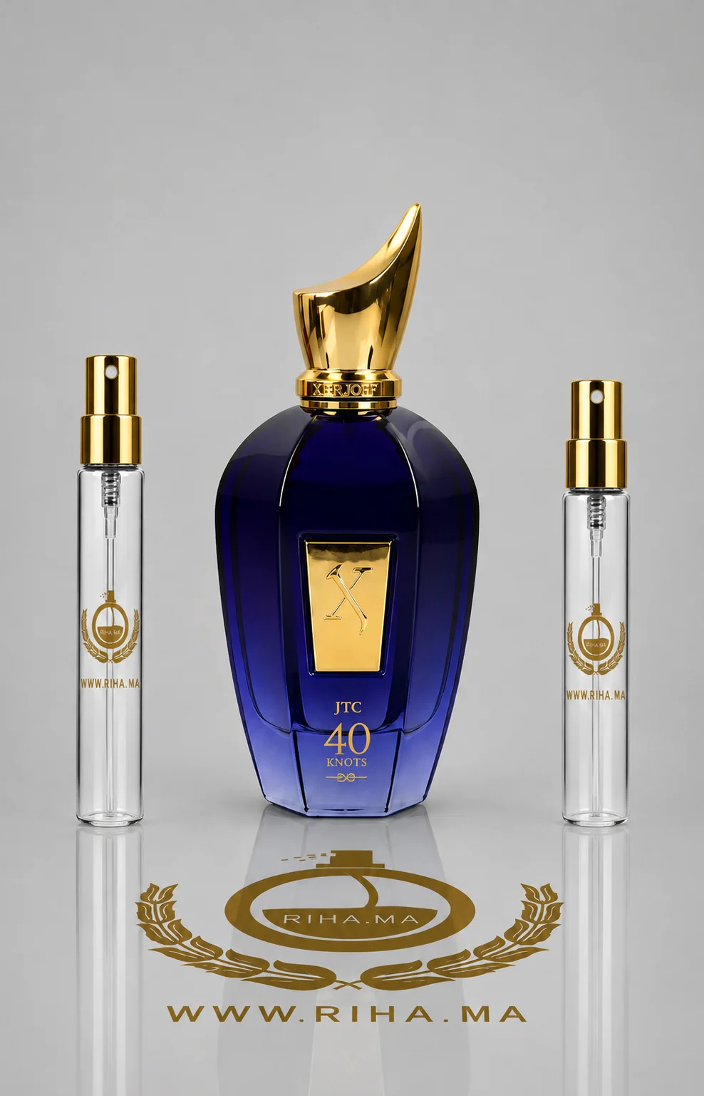 Decantage 40 Knots Xerjoff Pour Homme decantage 40 knots — Flacon de décantage 40 knots Xerjoff posé sur du sable