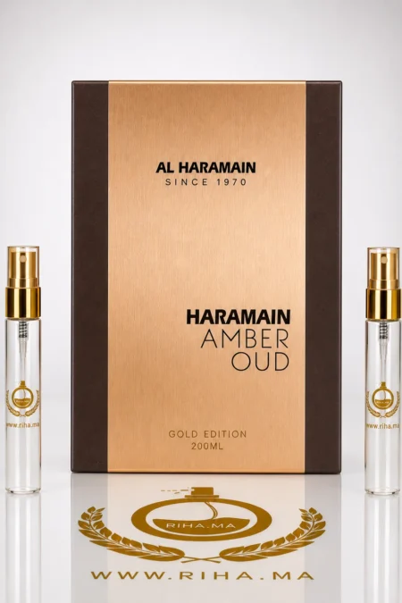 decantage amber oud al haramain perfumes — Flacon de décantage amber oud al haramain perfumes posé sur fond doré