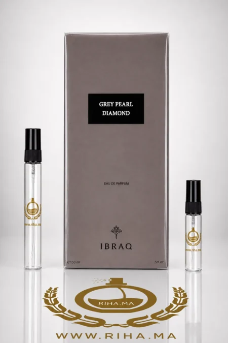decantage grey pearl diamond ibrahim al qurashi — Flacon de décantage grey pearl diamond ibrahim al qurashi posé sur fond doré