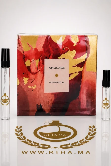decantage guidance — Flacon de décantage guidance 46 amouage posé sur fond doré