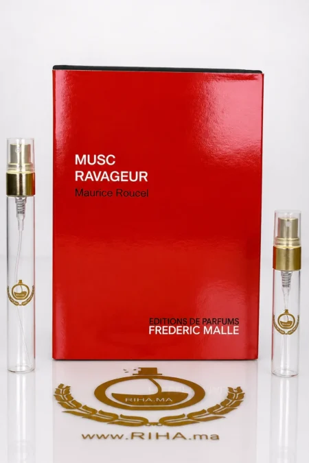 decantage musc ravageur frederic malle — Flacon de décantage Musc Ravageur Frederic Malle posé sur fond doré