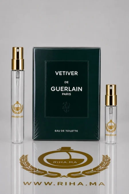 decantage vetiver guerlain — Flacon de décantage vetiver guerlain posé sur fond sombre