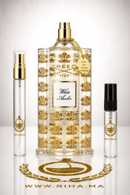 Flacon de decantage white amber creed posé sur fond élégant