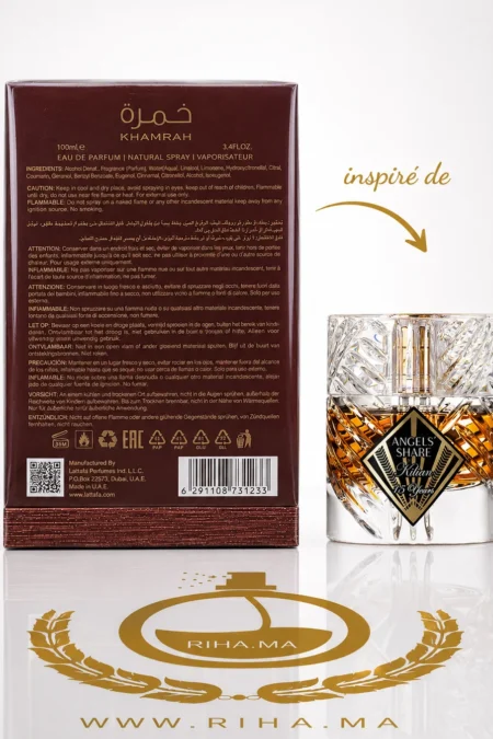 Flacon de parfum Khamrah Qahwa Lattafa posé sur fond doré — vue 2