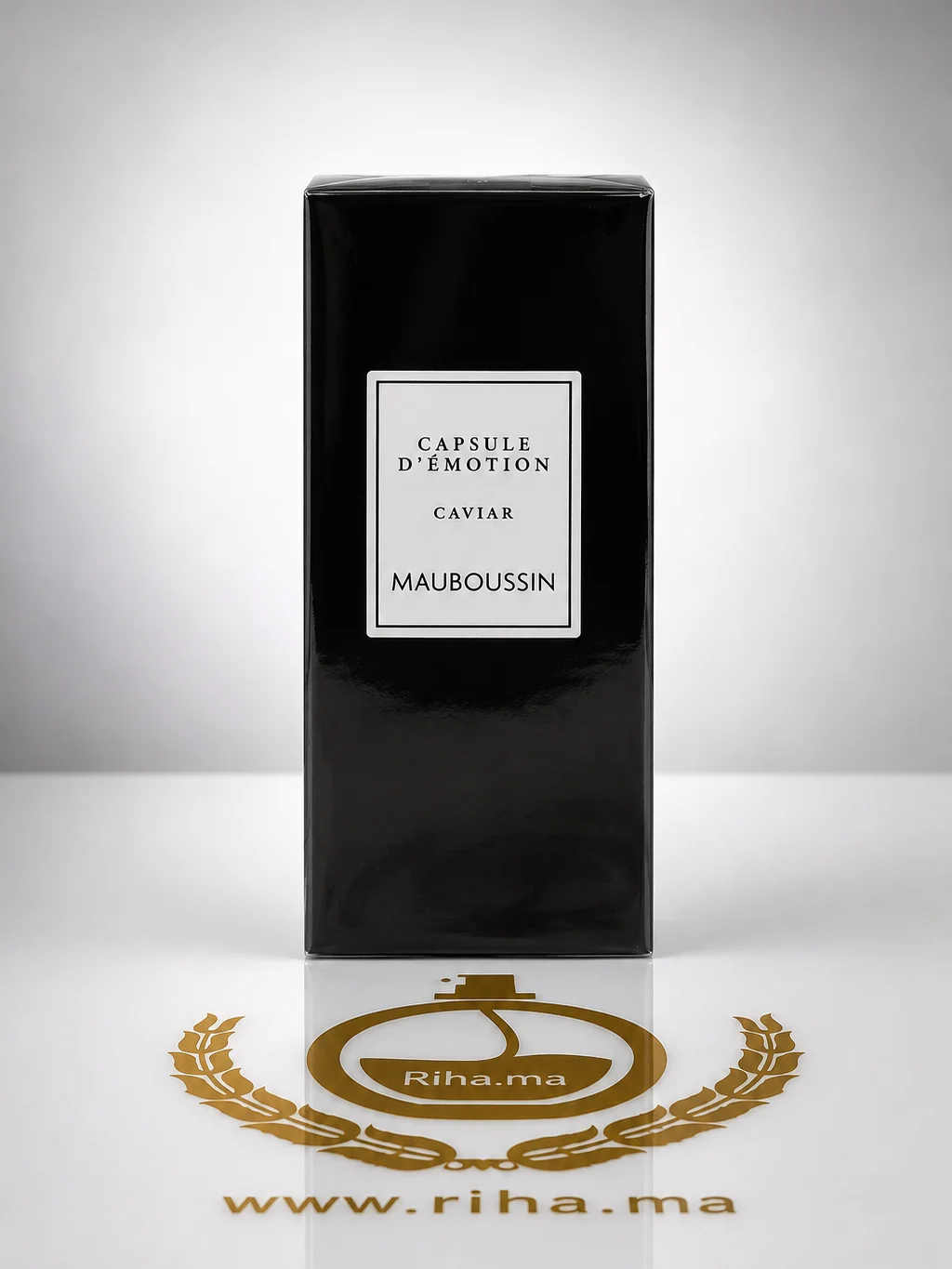 Mauboussin Capsule d'émotion Caviar eau de parfum 100ml mauboussin capsule demotion caviar — Flacon de Mauboussin Capsule d'émotion Caviar sur fond bleu