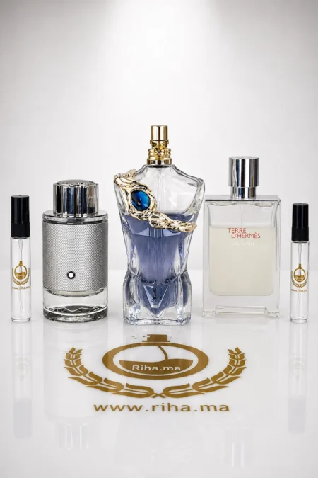 pack decantage homme — Pack décantage homme avec trois flacons de parfum sur fond neutre