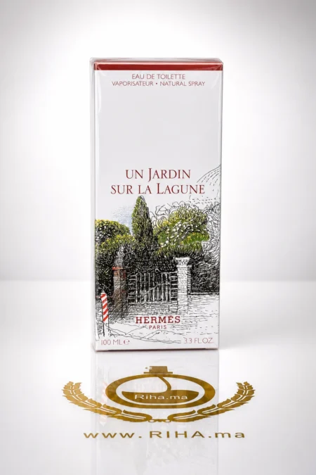 Flacon d'un jardin sur la lagune Hermès posé sur une surface claire