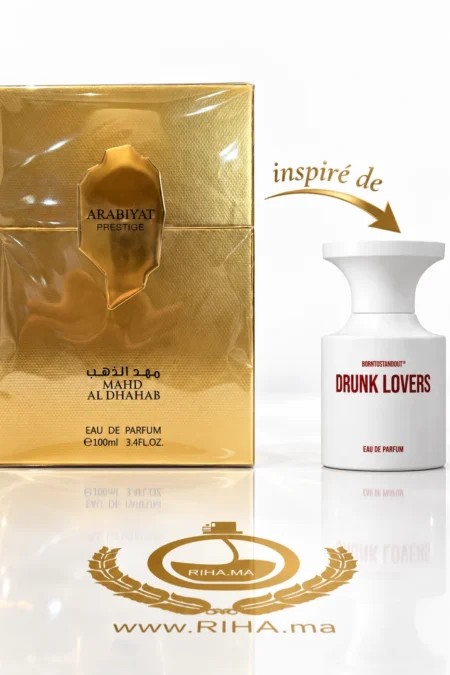 Flacon Mahd Al Dhahab Eau De Parfum doré sur fond ambré